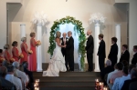 Wedding Ceremony: Bride, Groom, Wedding Party, Arch, Columns, Greenery, Feathers Wedding Reception: white ostrich feathers & cylinders. Wedding Ceremony @ UAW Hall in Spring Hill, TN
