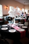 Reception Tables: Black, white, silver charges, cylinders, candles Wedding Reception: white ostrich feathers & cylinders. Wedding Ceremony @ UAW Hall in Spring Hill, TN